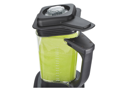 Blender full of cocktail mixture with the lid open