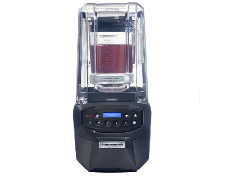 A blender full of smoothie mixture taken from the front view