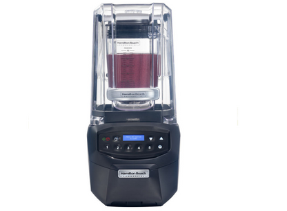 A blender full of smoothie mixture taken from the front view